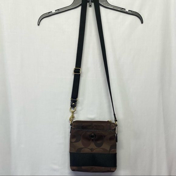 Coach Handbags - Coach Swingpack Signature Logo Canvas CrossBody Bag